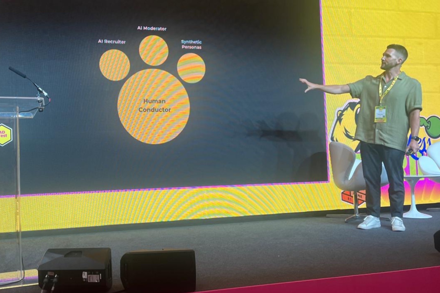 Alec Barr presenting the pawprint of AI research at MAD//Fest London